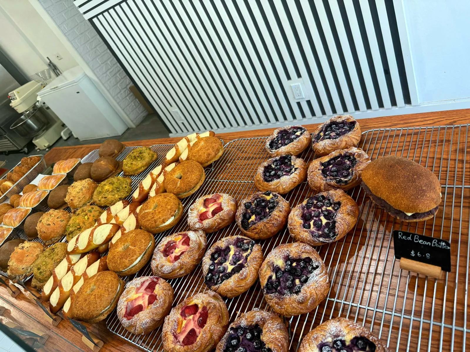 Laminated pastry display inside Bricolage Bakery, Toronto